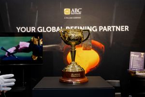 Gold Melbourne Cup trophy on display at ABC Refinery Global Refining Partner exhibition booth.