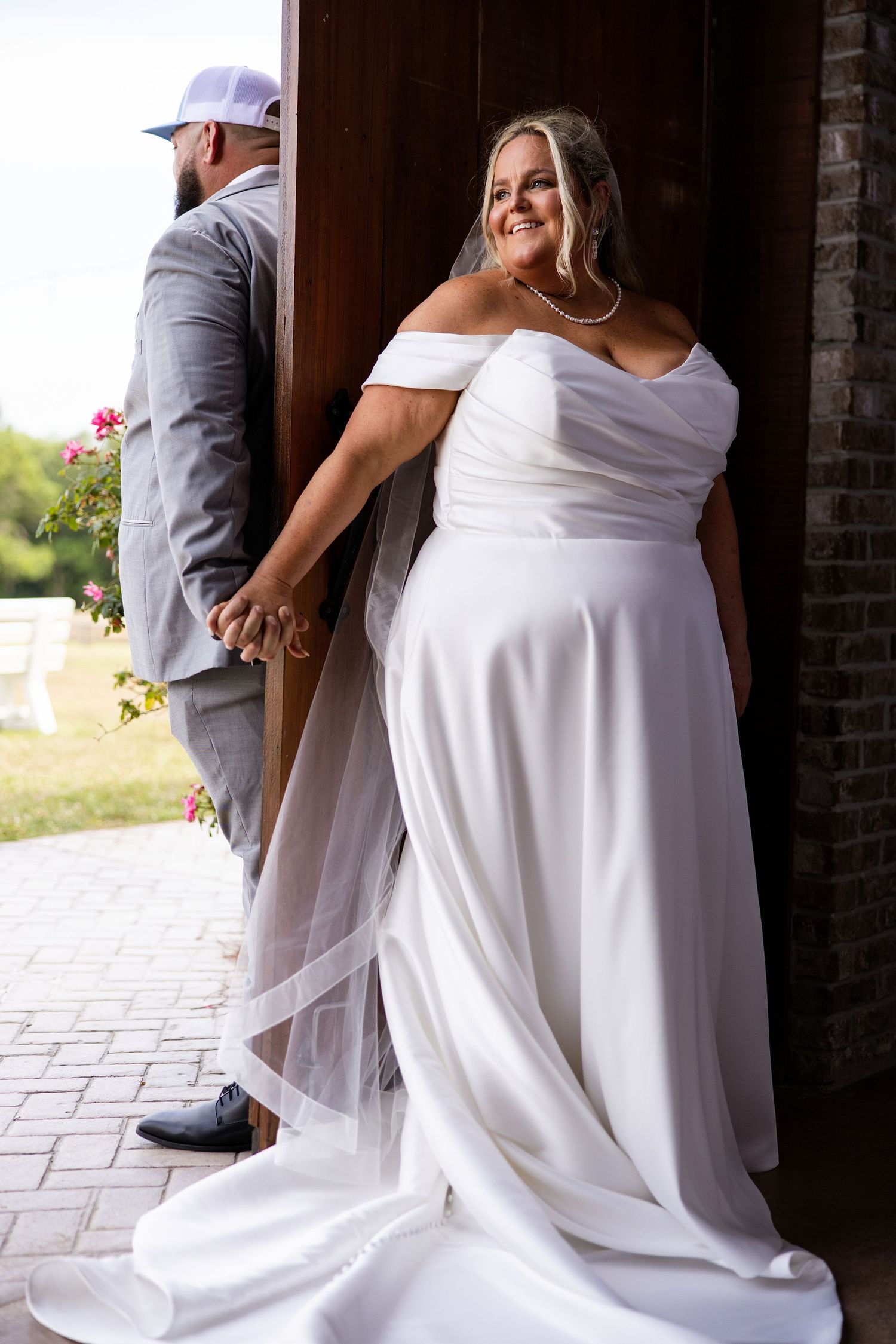wedding couple being photographed in Pensacola