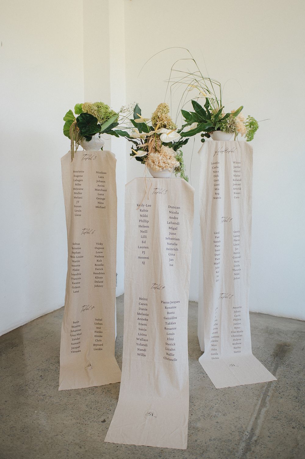 Bride Sidekick floral arrangements and table seating