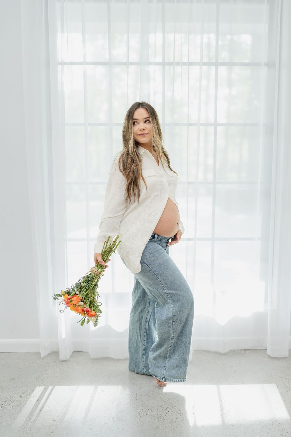 Maternity Family Photo Session by Conroe Photographer and Houston Photographer, Studio, white top and blue jeans