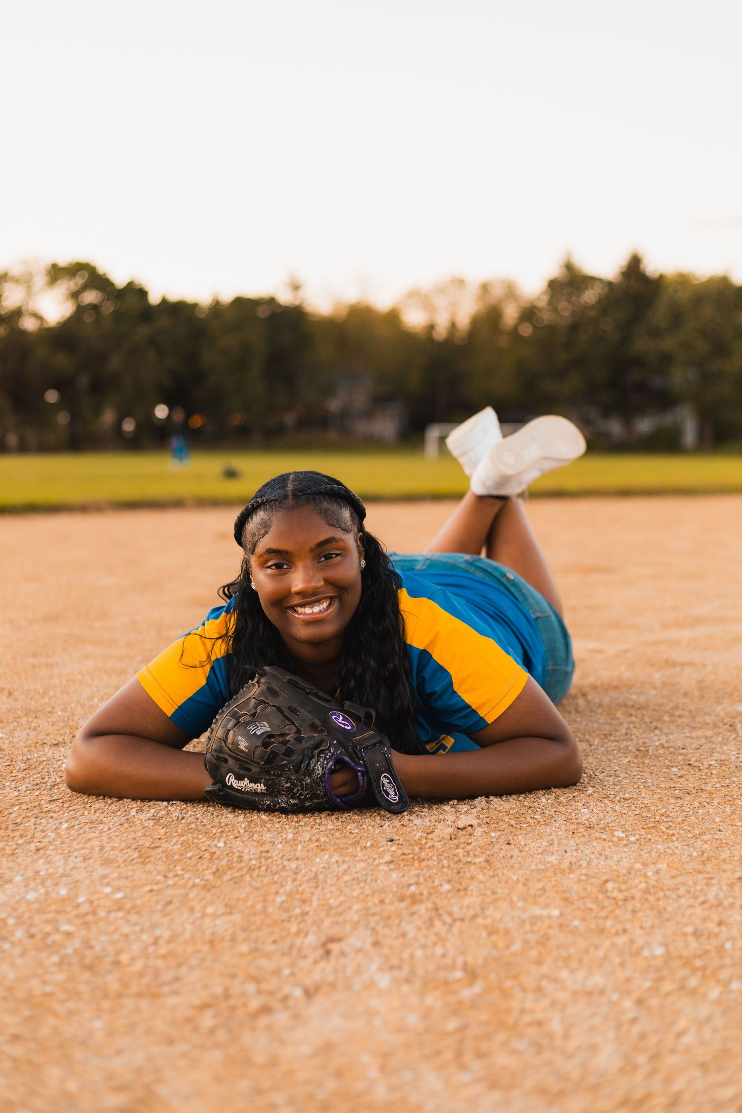 high school senior photos baseball glove bat field athlete girl jersey madison wi memorial west props sports talent hobby interests athletic