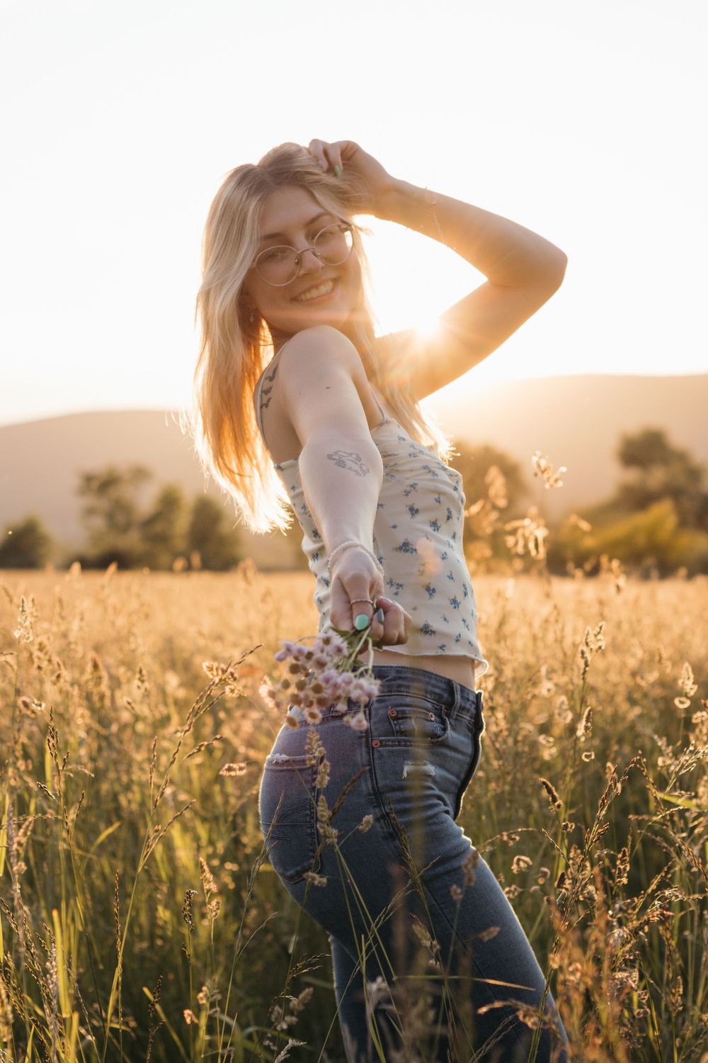 Frolicking in a wildflower field at golden hour sunset