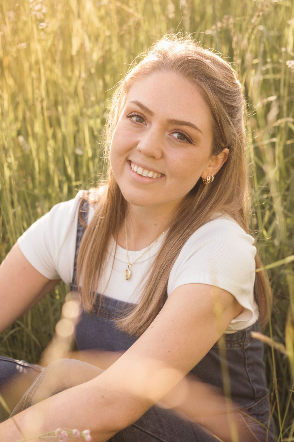 Frolicking in a wildflower field at golden hour sunset