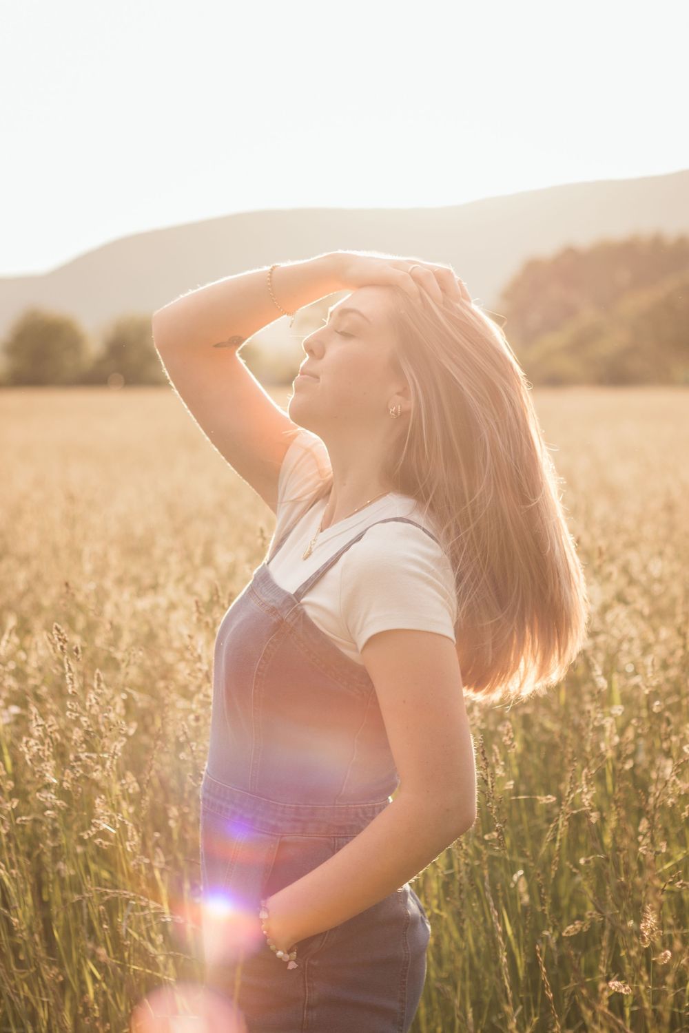 Frolicking in a wildflower field at golden hour sunset