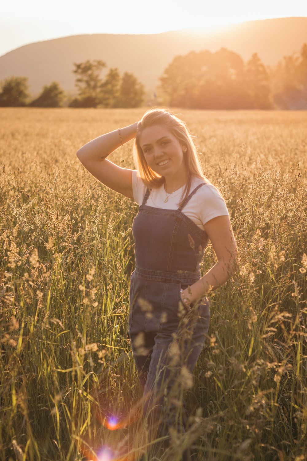 Frolicking in a wildflower field at golden hour sunset