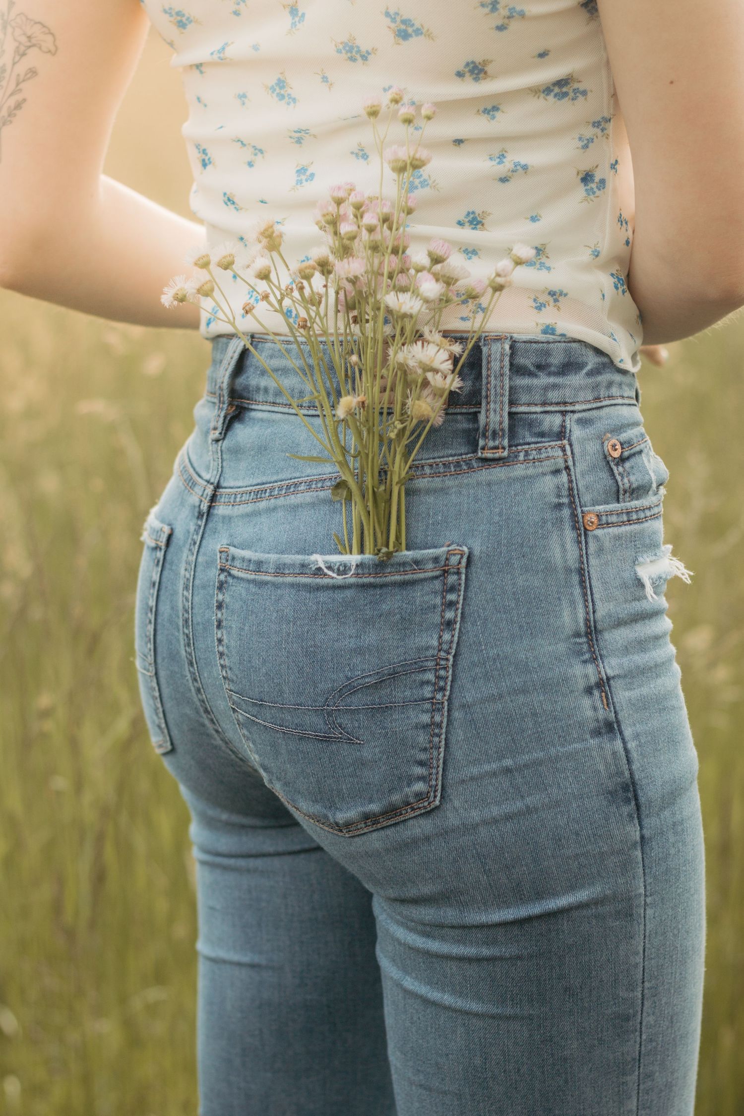 Frolicking in a wildflower field at golden hour sunset