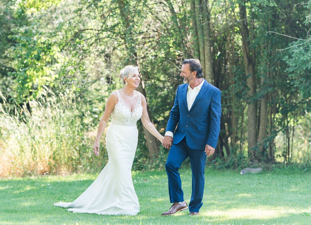 An emotional first look moment between the bride and groom before their ceremony, filled with joy and excitement