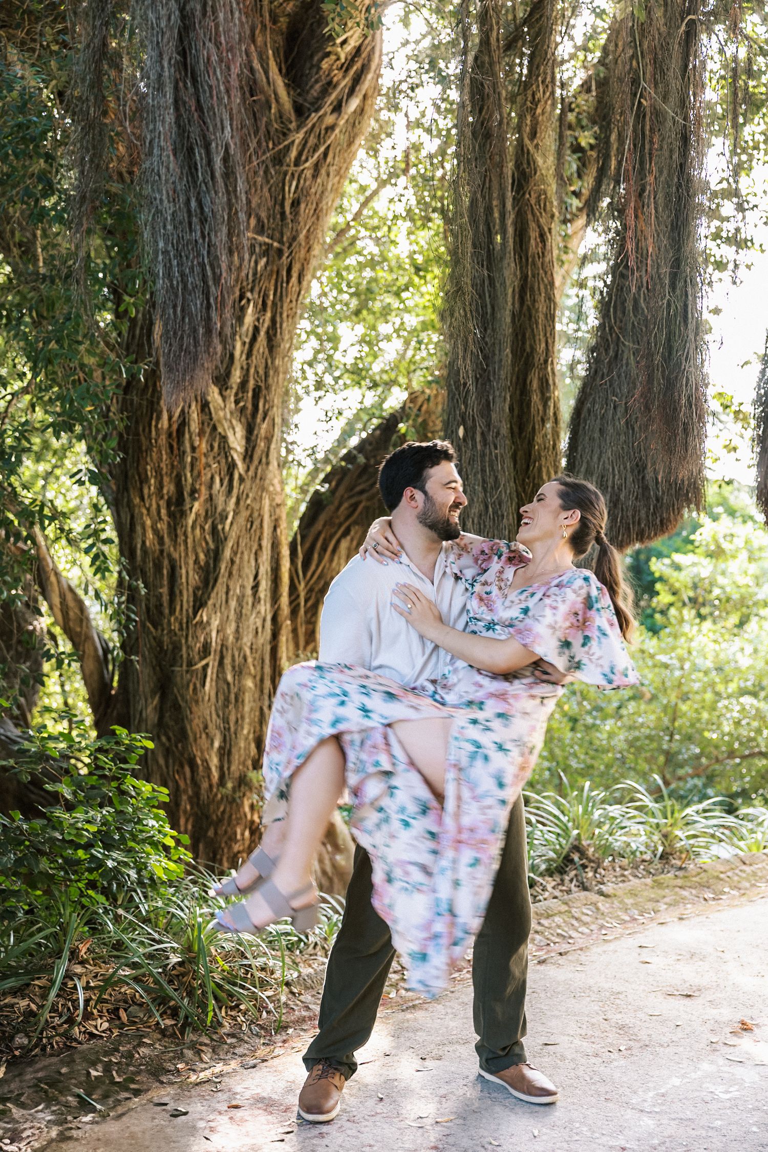 romantic couple walking Monserrate Palace gardens Sintra engagement session
