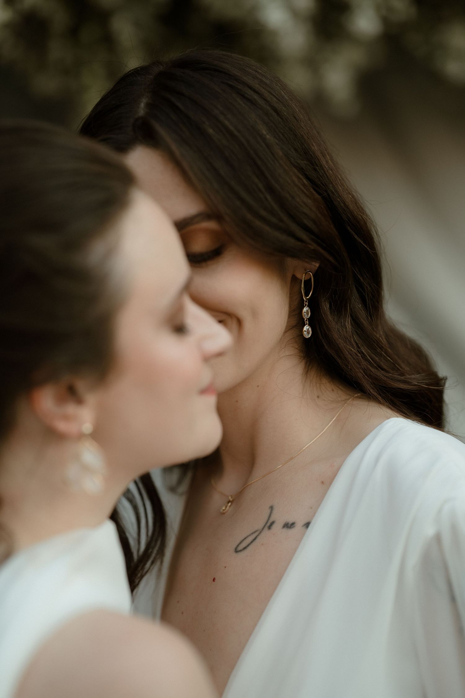 A close-up artistic series of romantic photos showing two people sharing intimate moments in soft lighting.
