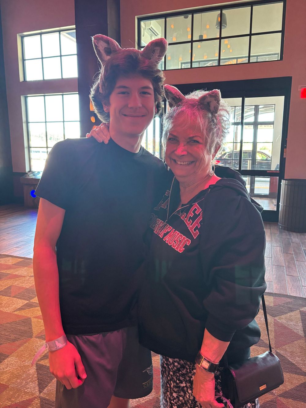 Two people in black shirts pose together at Great Wolf Lodge, Perryville, MD.