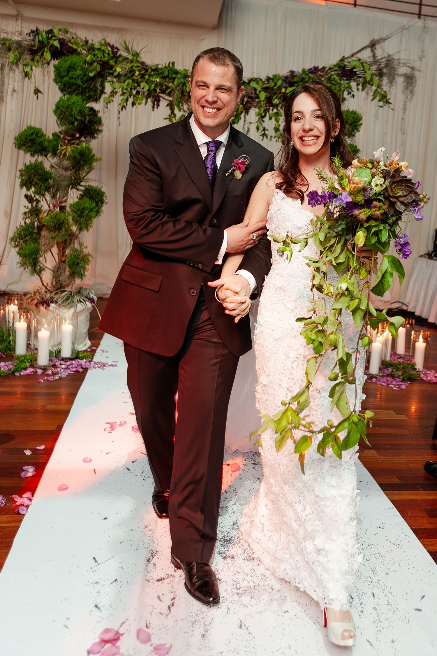 A sequence of wedding photos showing a couple dancing and twirling in a decorated indoor venue.