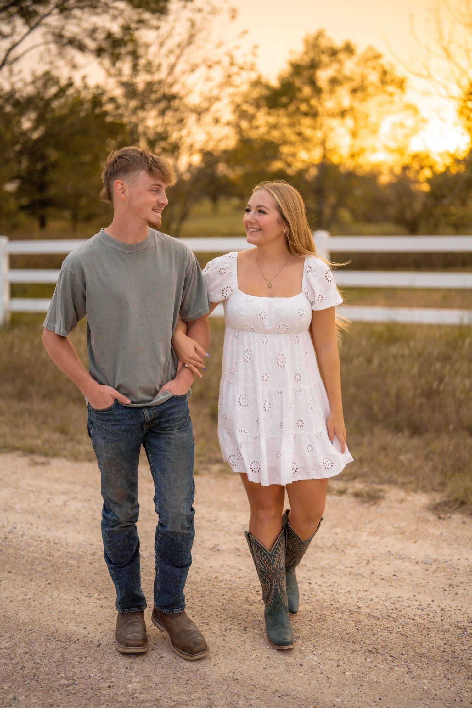 Couples Session on a dirt road at sunset.