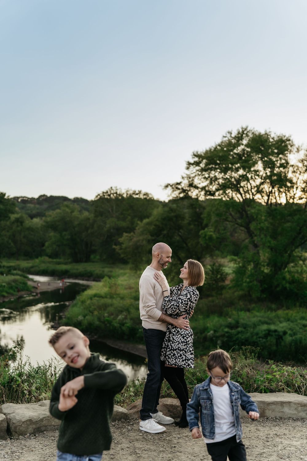 A scenic outdoor photoshoot at sunset by a river with trees and natural landscape of Cascade Valley Metro Park in Akron, Ohio Family Photos