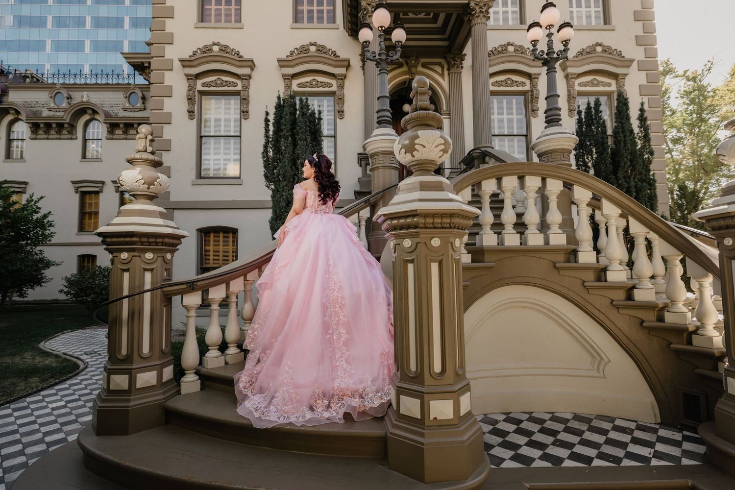 Flowing pink princess dress captured at multiple angles on a historic building's exterior.