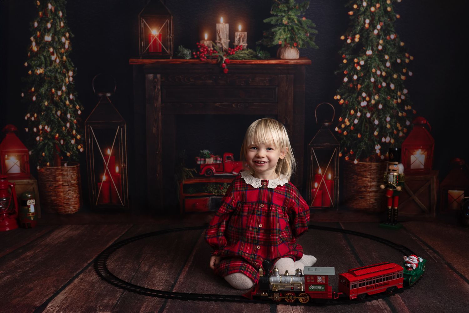 A cozy Christmas scene with decorated trees, red presents, and vintage toys in a dark moody room.
