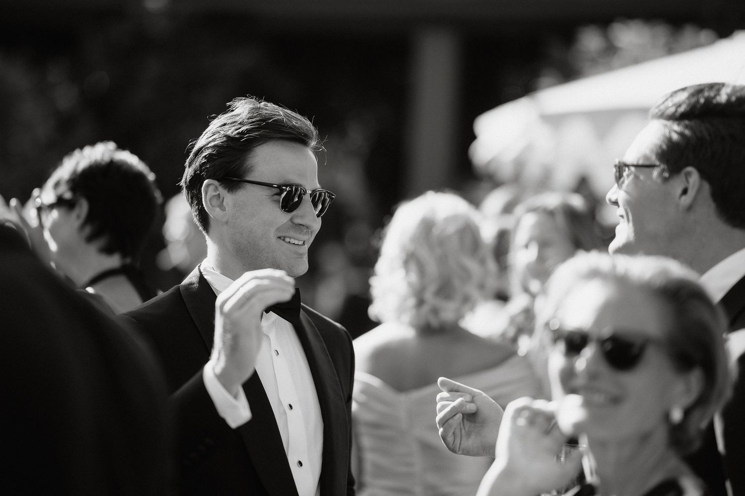 A black and white photo montage showing several formal events with people in tuxedos and formal attire at social gatherings.