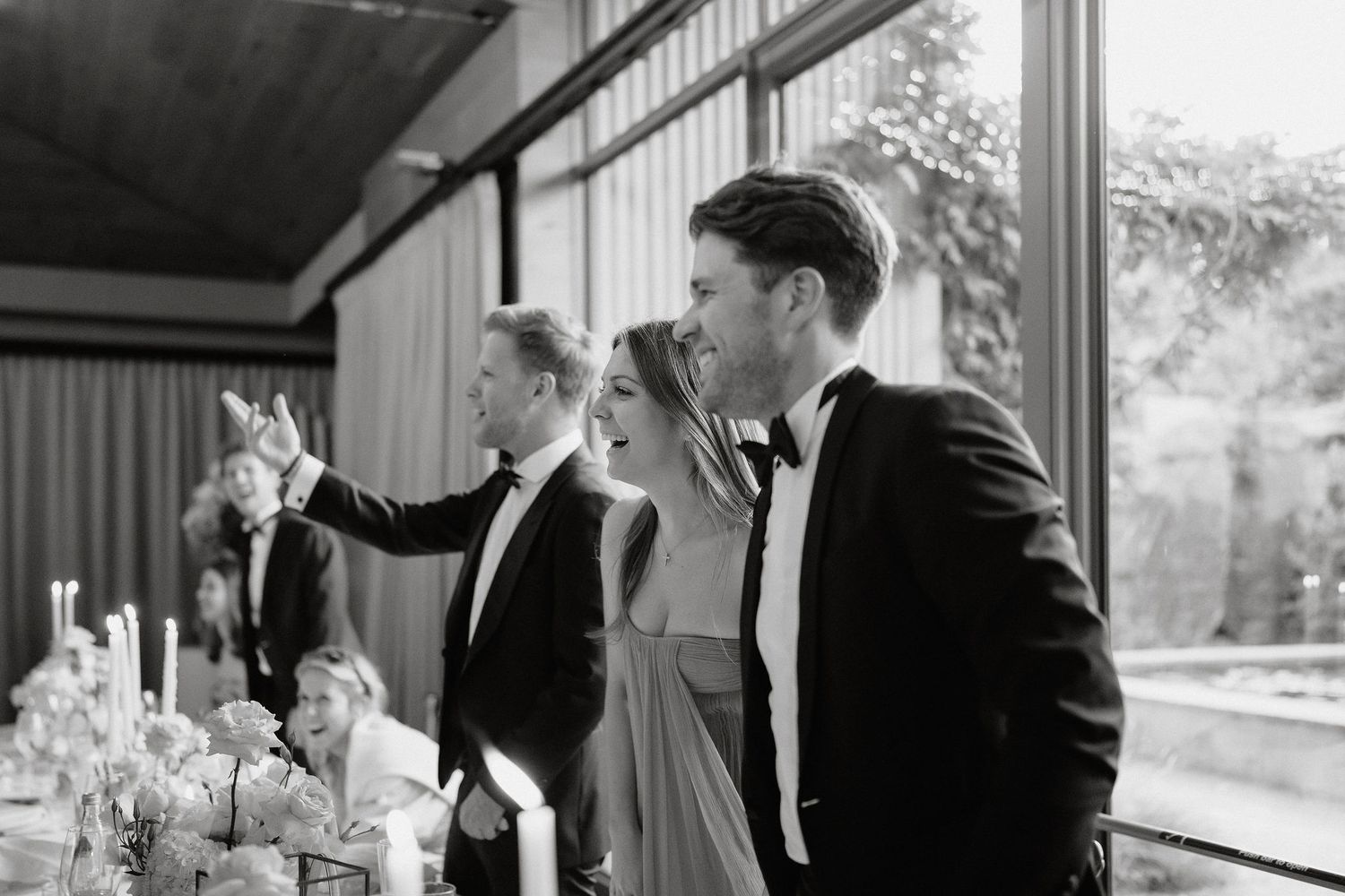 A black and white wedding photo collage showing intimate moments between a couple during their special day.