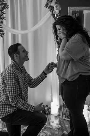 A black and white photo sequence shows a couple dancing together in an intimate setting with white curtains.