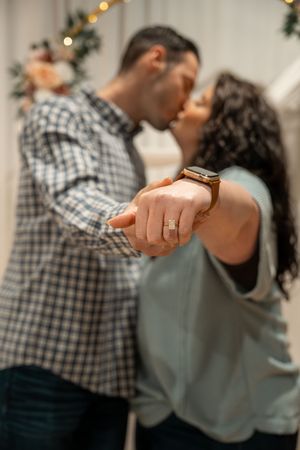 A romantic couple shares an intimate dance together in a series of connected photos showing different dance poses.