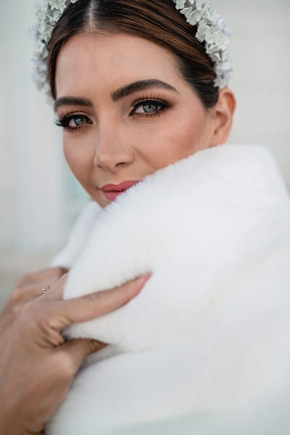 Close-up bridal portraits with soft white tulle creating dreamy ethereal effects.