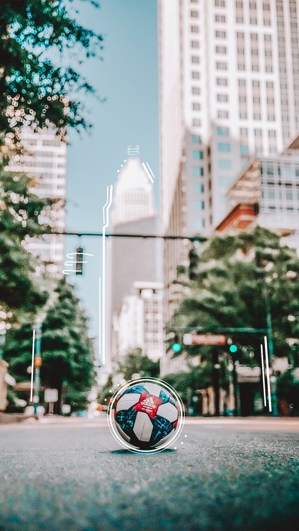 Adidas MLS soccer ball on a city street with urban skyscrapers and neon light effects in Charlotte.
