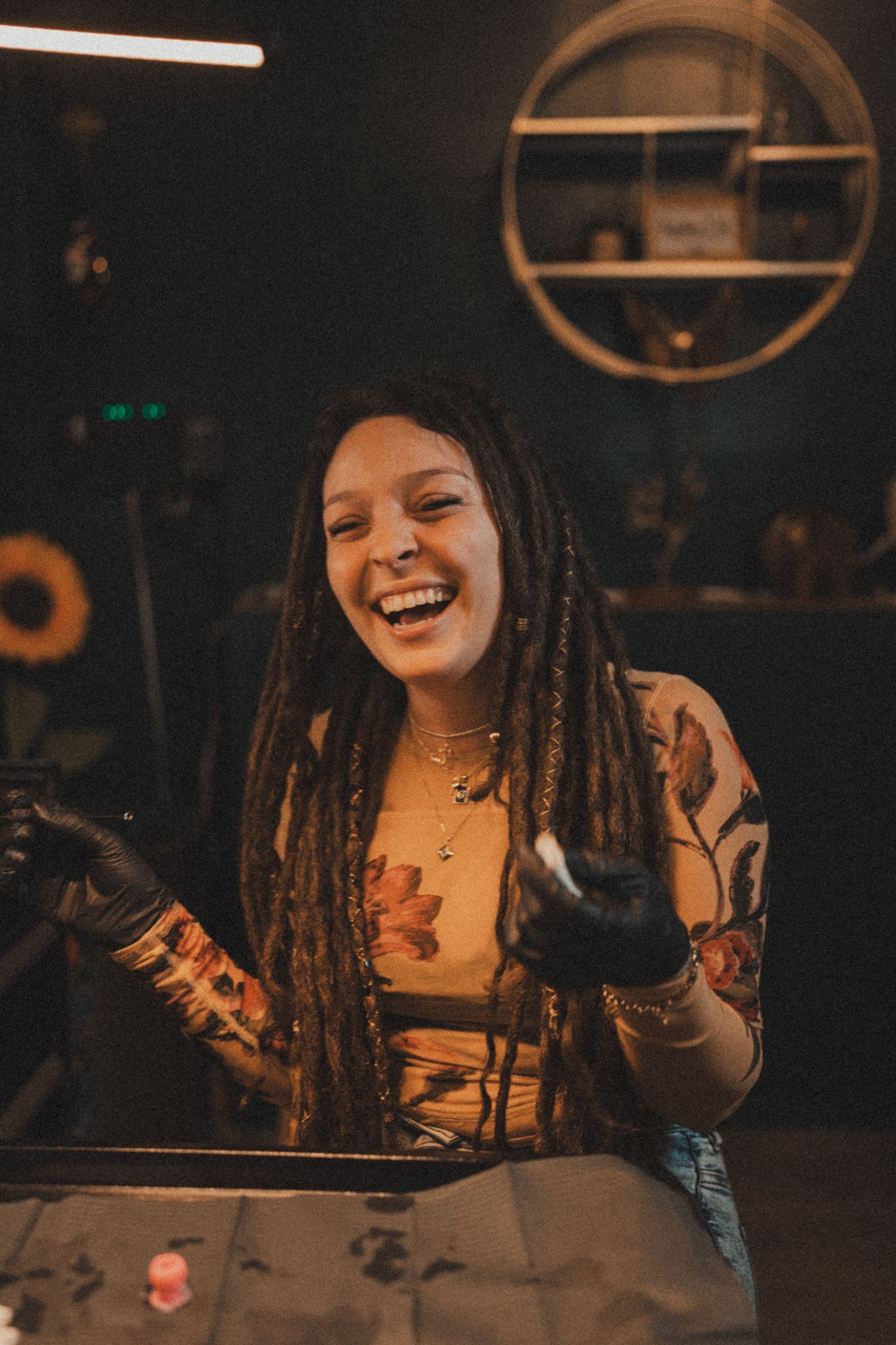 Candid nighttime portraits showing joyful expressions and laughter.