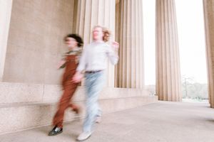 Artistic motion blur photos in classical columned architecture setting.