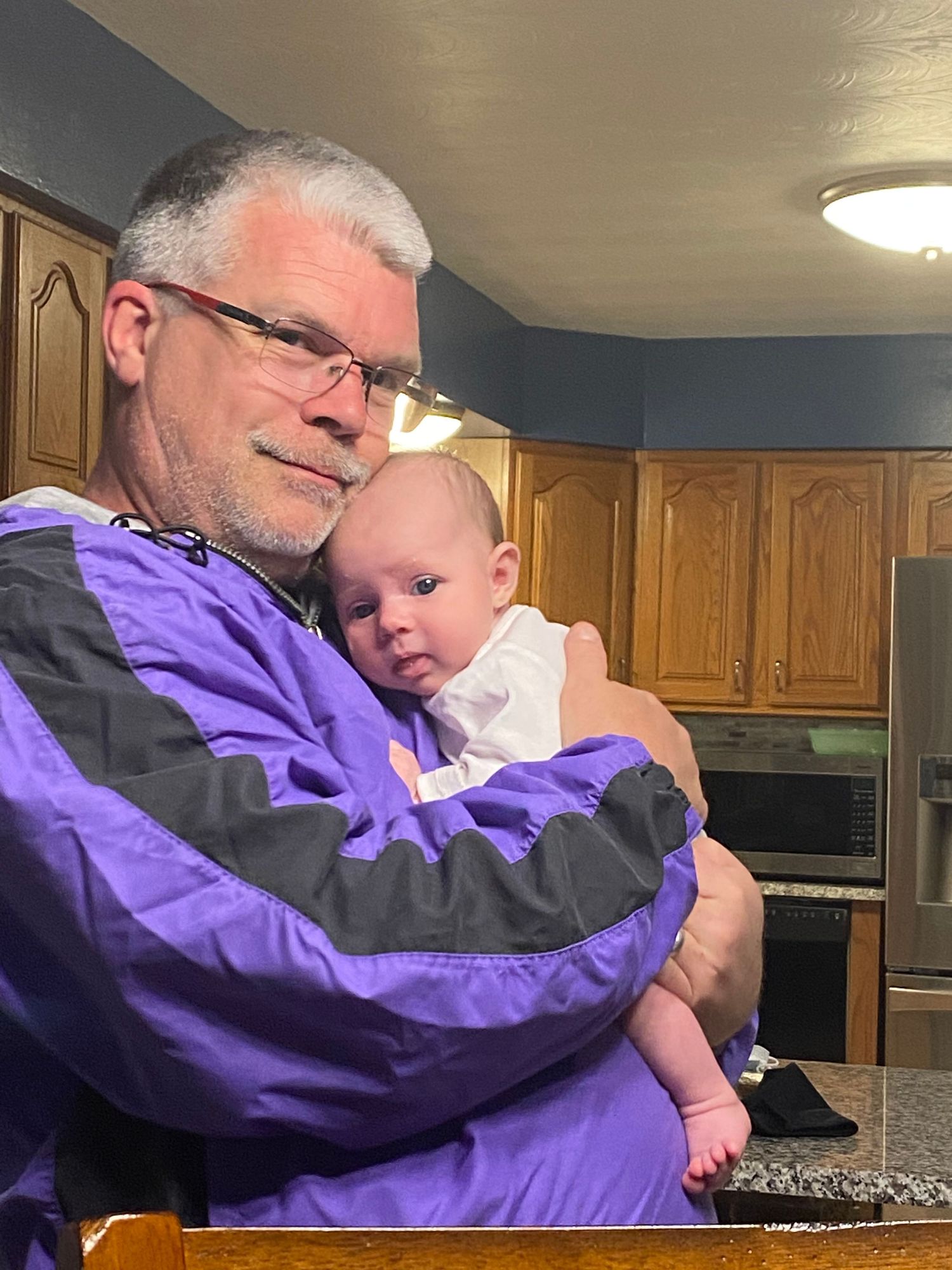 Springfield, IL photographer shows a glimpse into her personal life with a picture of her baby girl with her dad