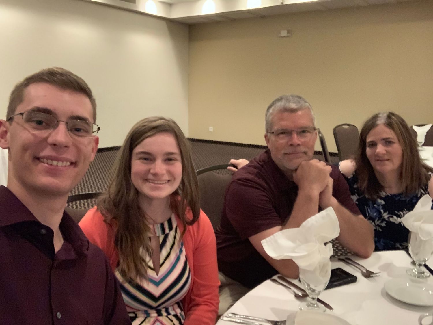Springfield, IL photographer shows a glimpse into her personal life with a picture of her, her husband, dad and mom together