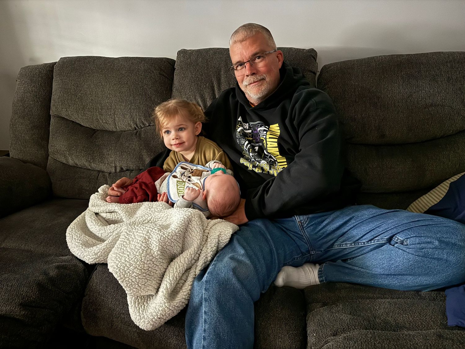 Springfield, IL photographer shows a glimpse into her personal life with a picture of two kids with her dad together.