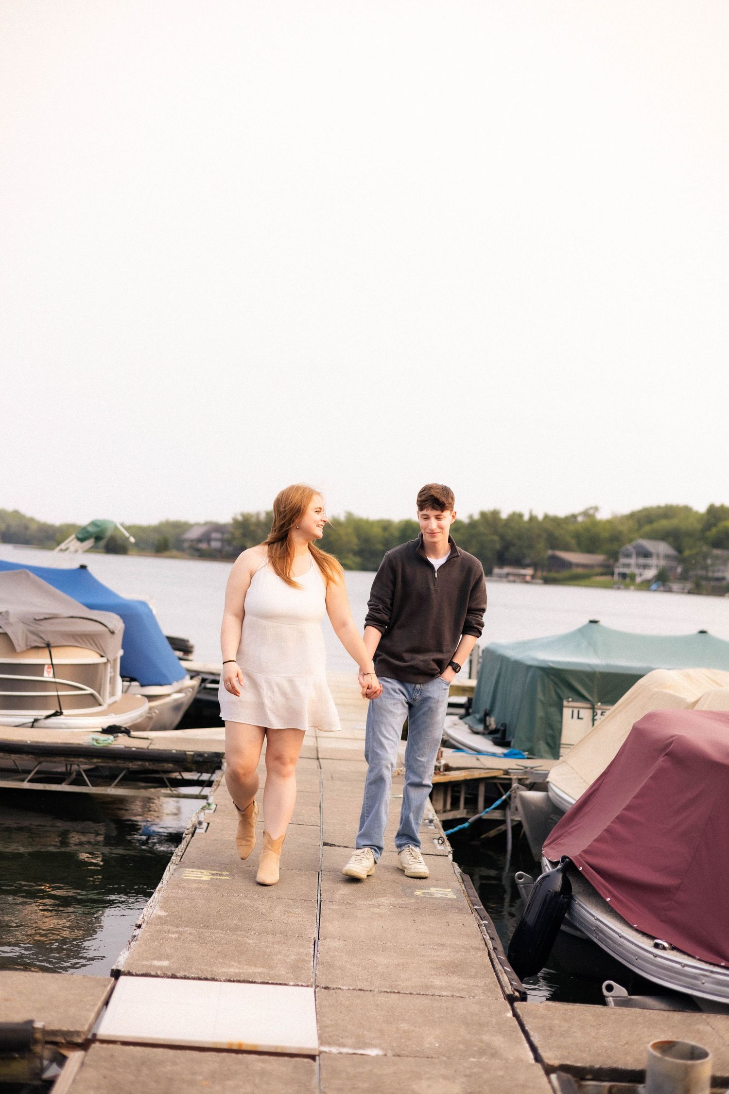 Outdoor summer engagement photos at the lake in Bloomington, Illinois