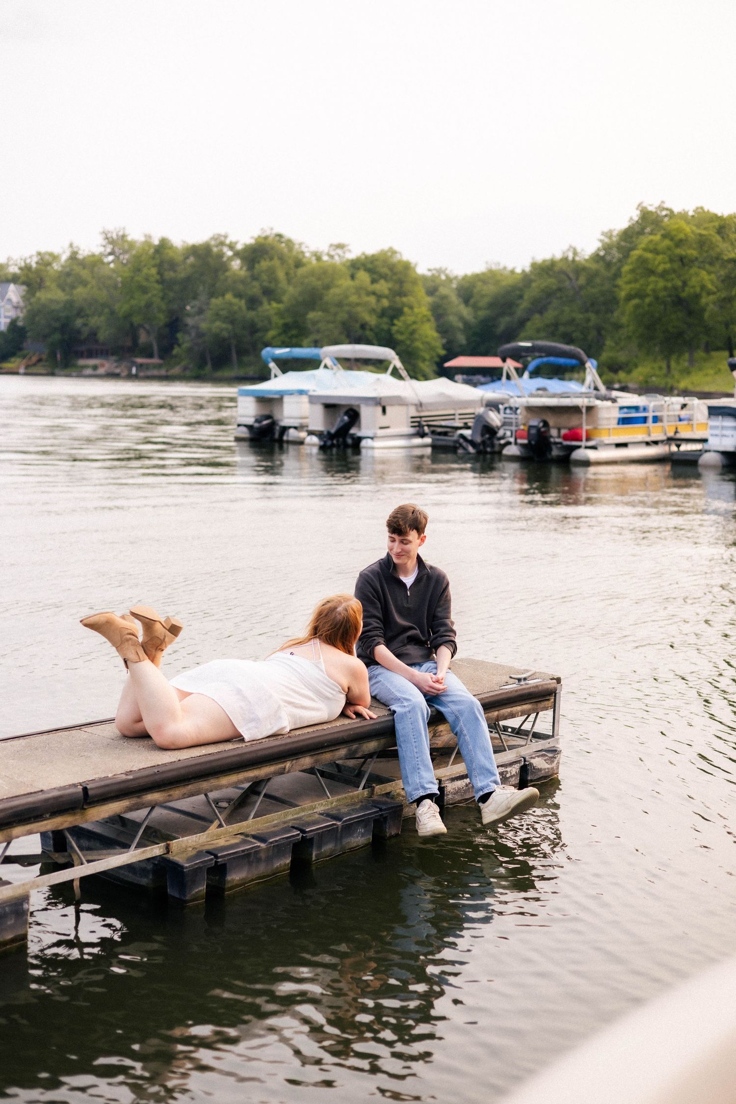 Outdoor summer engagement photos at the lake in Bloomington, Illinois