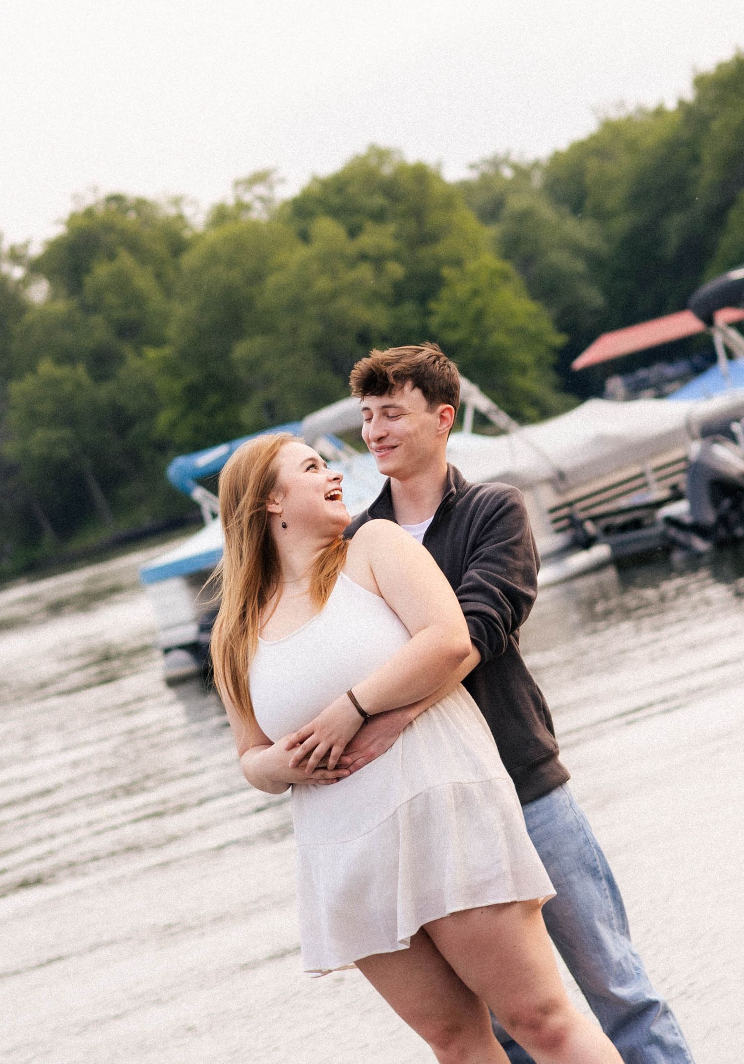 Outdoor summer engagement photos at the lake in Bloomington, Illinois