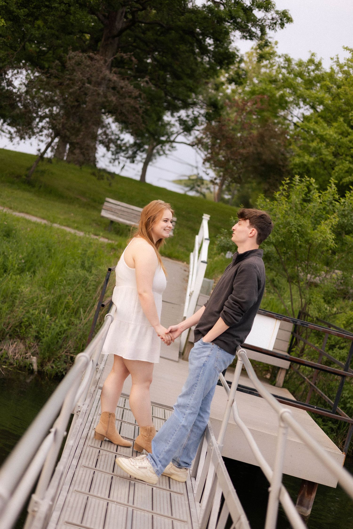 Outdoor summer engagement photos at the lake in Bloomington, Illinois