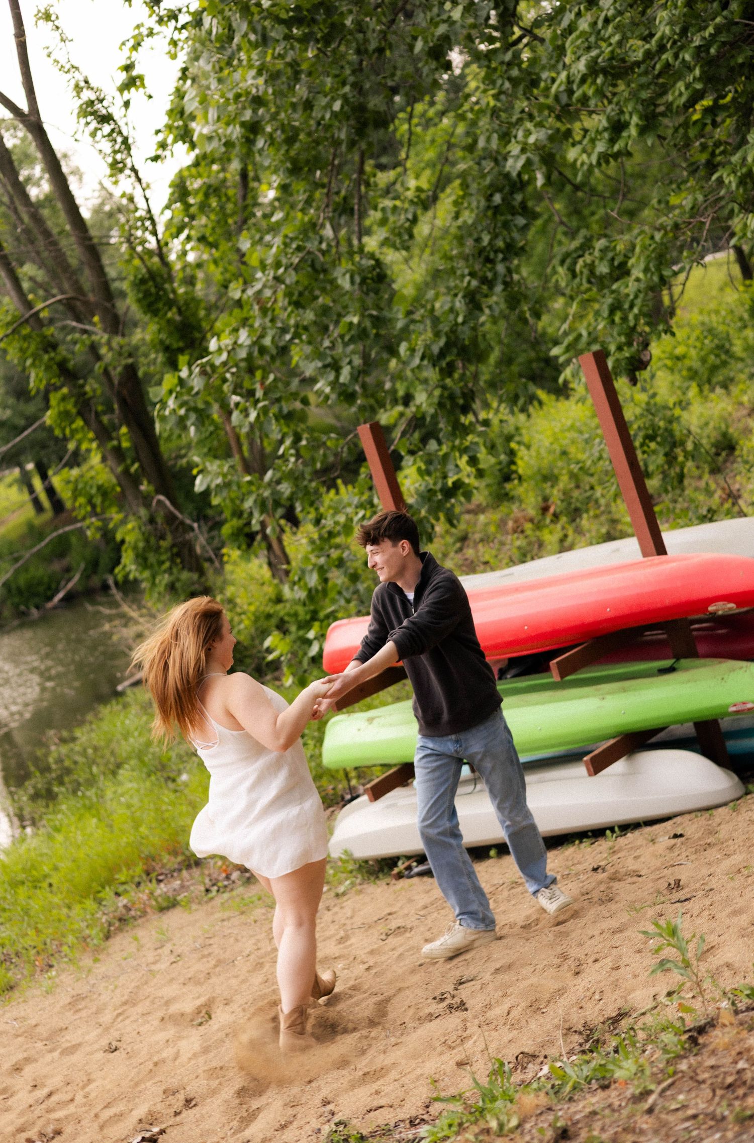 Outdoor summer engagement photos at the lake in Bloomington, Illinois
