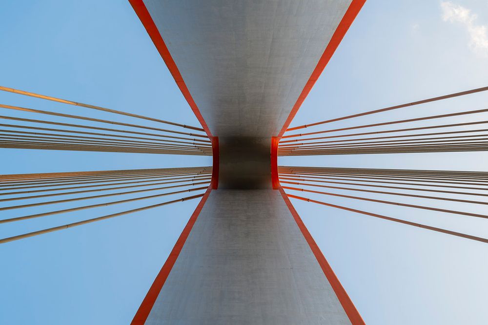 Architectural photo capturing a pedestrian and cycling bridge