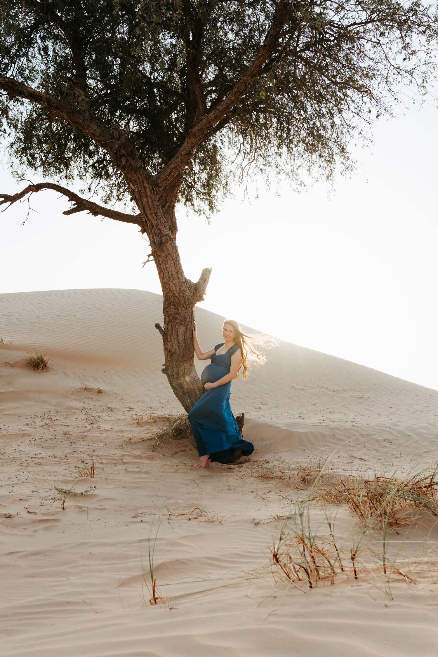 beach photoshoot in abu dhabi clinet closet options red dress