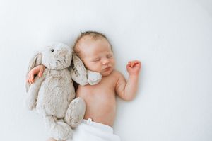 Newborn with teddy