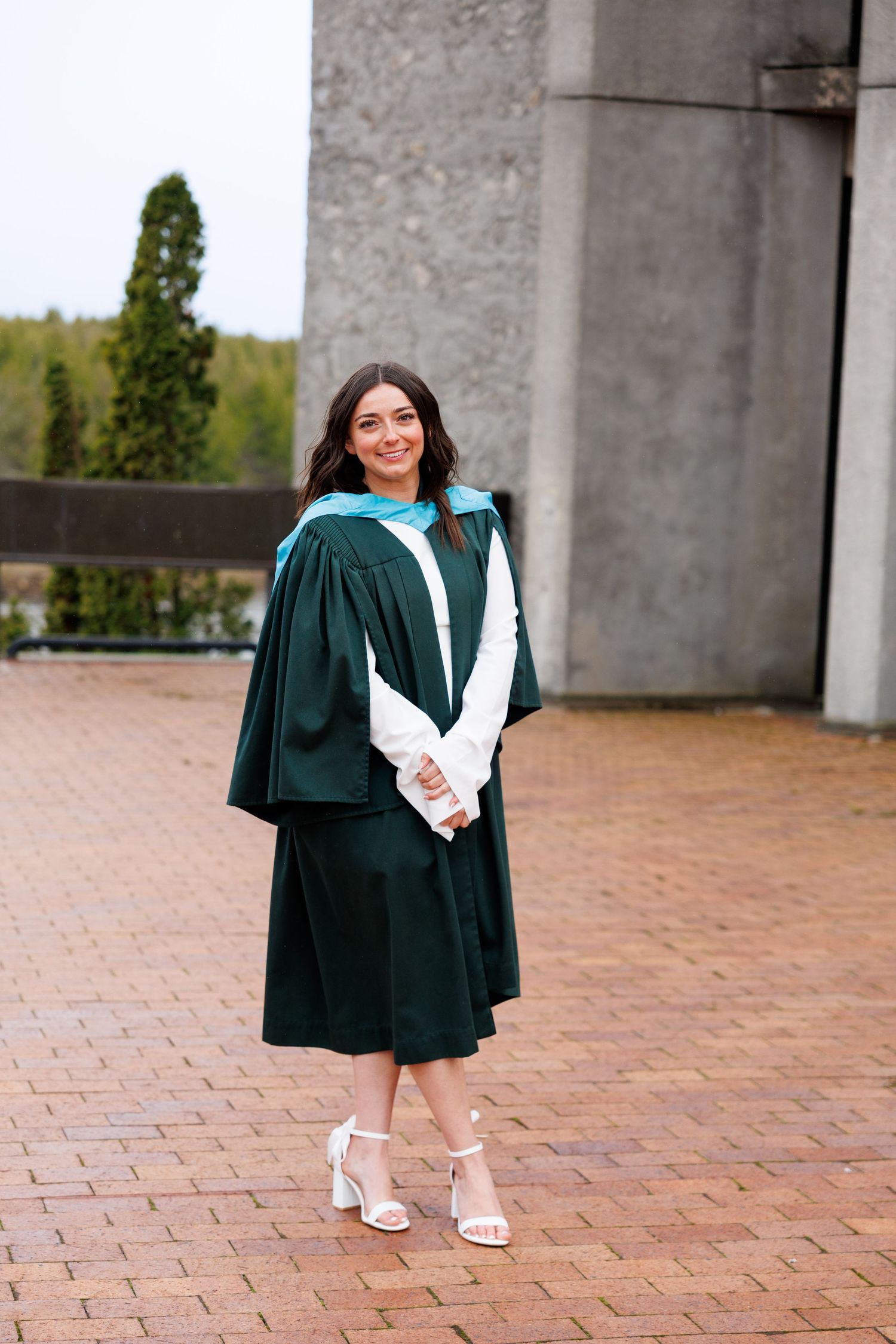 A sequence of graduation photos featuring someone in a dark green academic robe posing on brick ground.