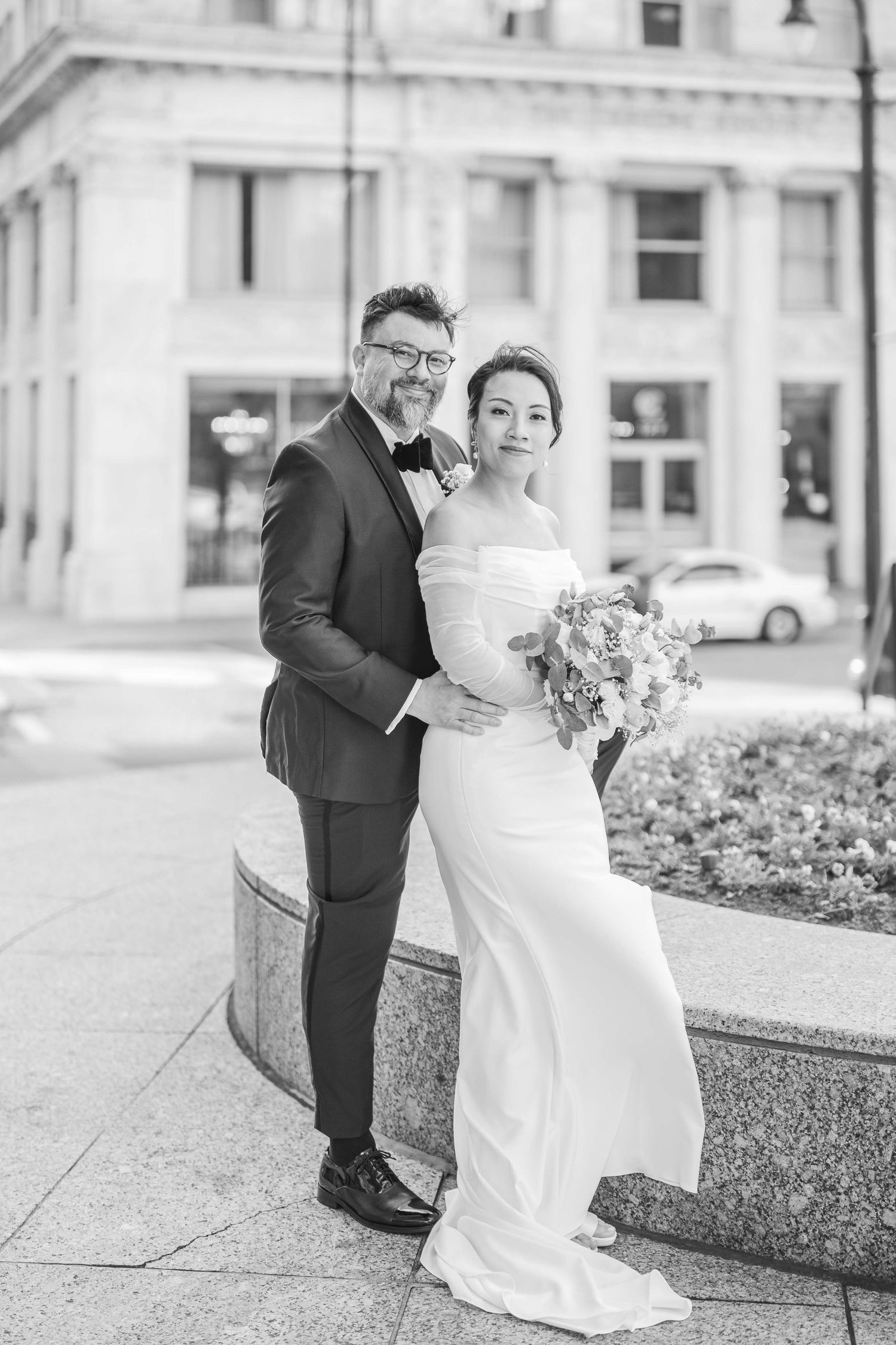 Black and white wedding portraits taken in an urban setting with architectural elements. Kelly Photography Atlanta Wedding Session.