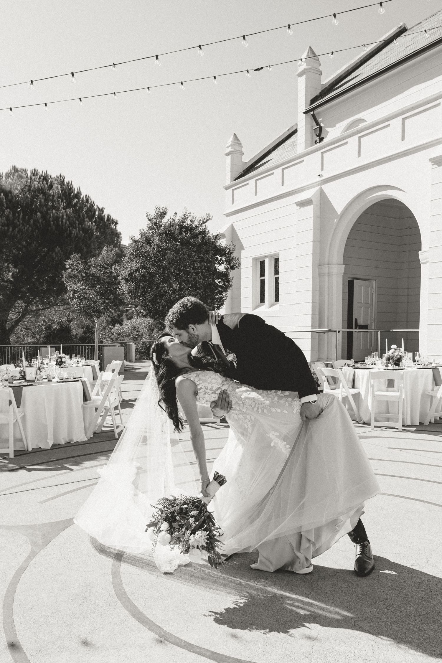 Black and white wedding photo sequence showing couple's first look moment in bright indoor setting.