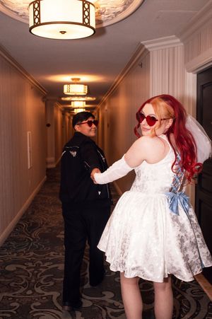 Bride leads down Las Vegas hotel hallway after ceremony