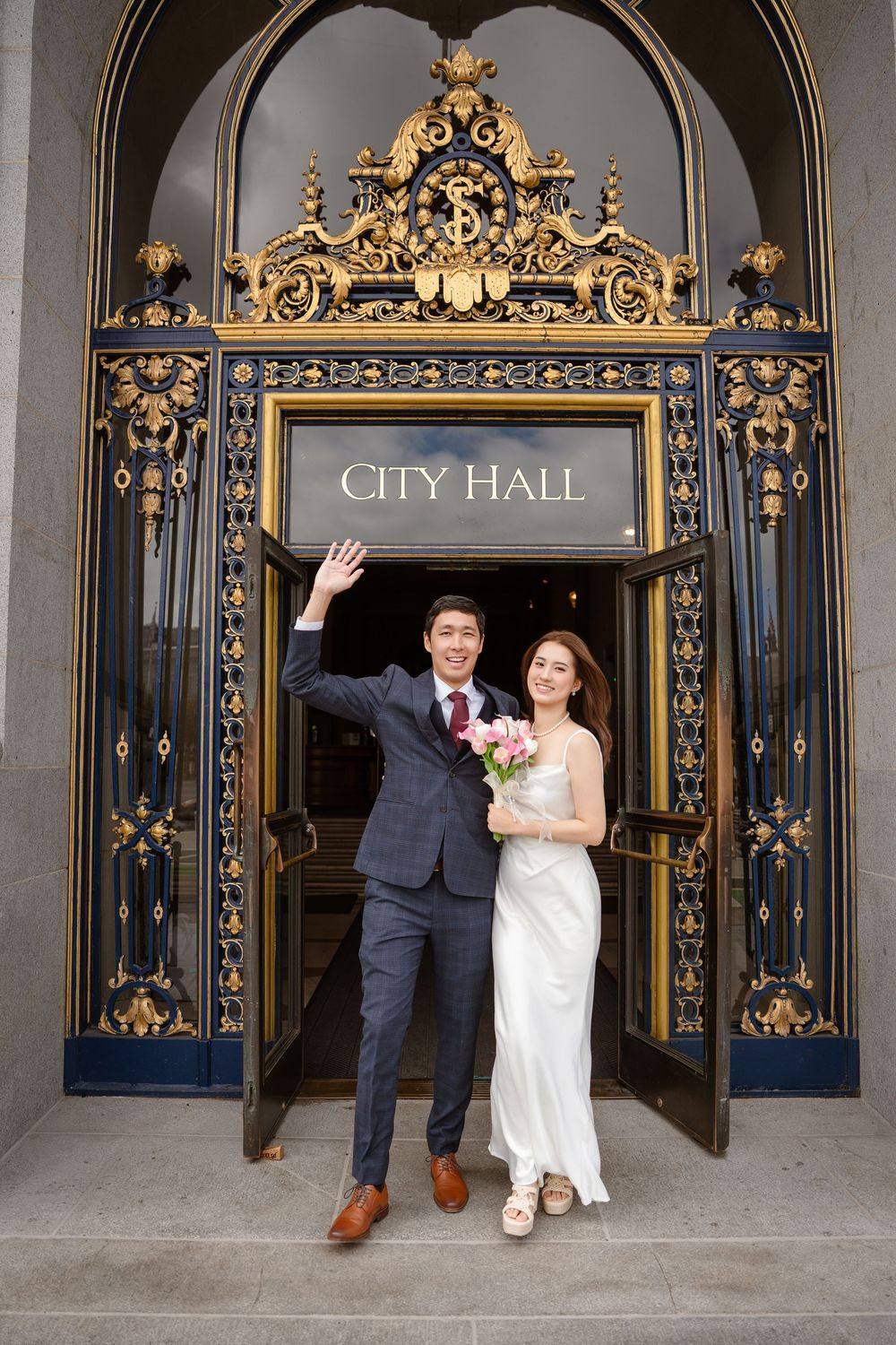 A series of photos showing a couple posing in front of ornate gold and black City Hall entrance gates.