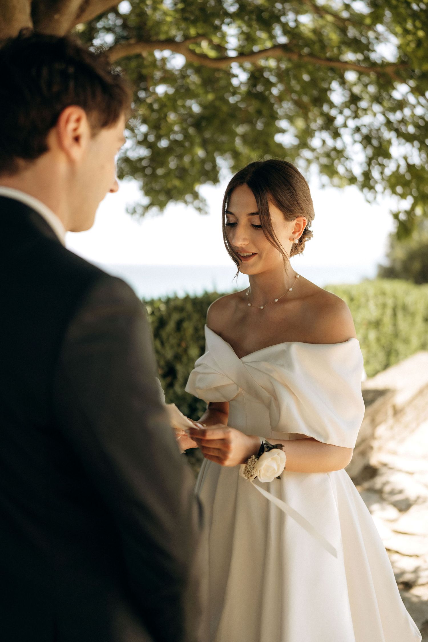 Couple sharing a special moment during their outdoor wedding ceremony.