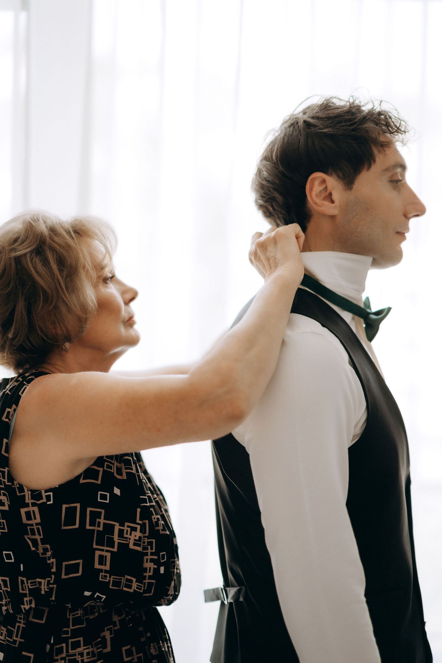 Sequence of intimate getting ready moments against a bright window backdrop.