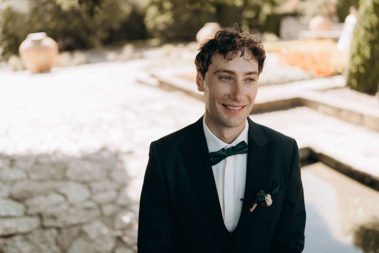 Elegant formal wedding portraits in classic black and white attire.
