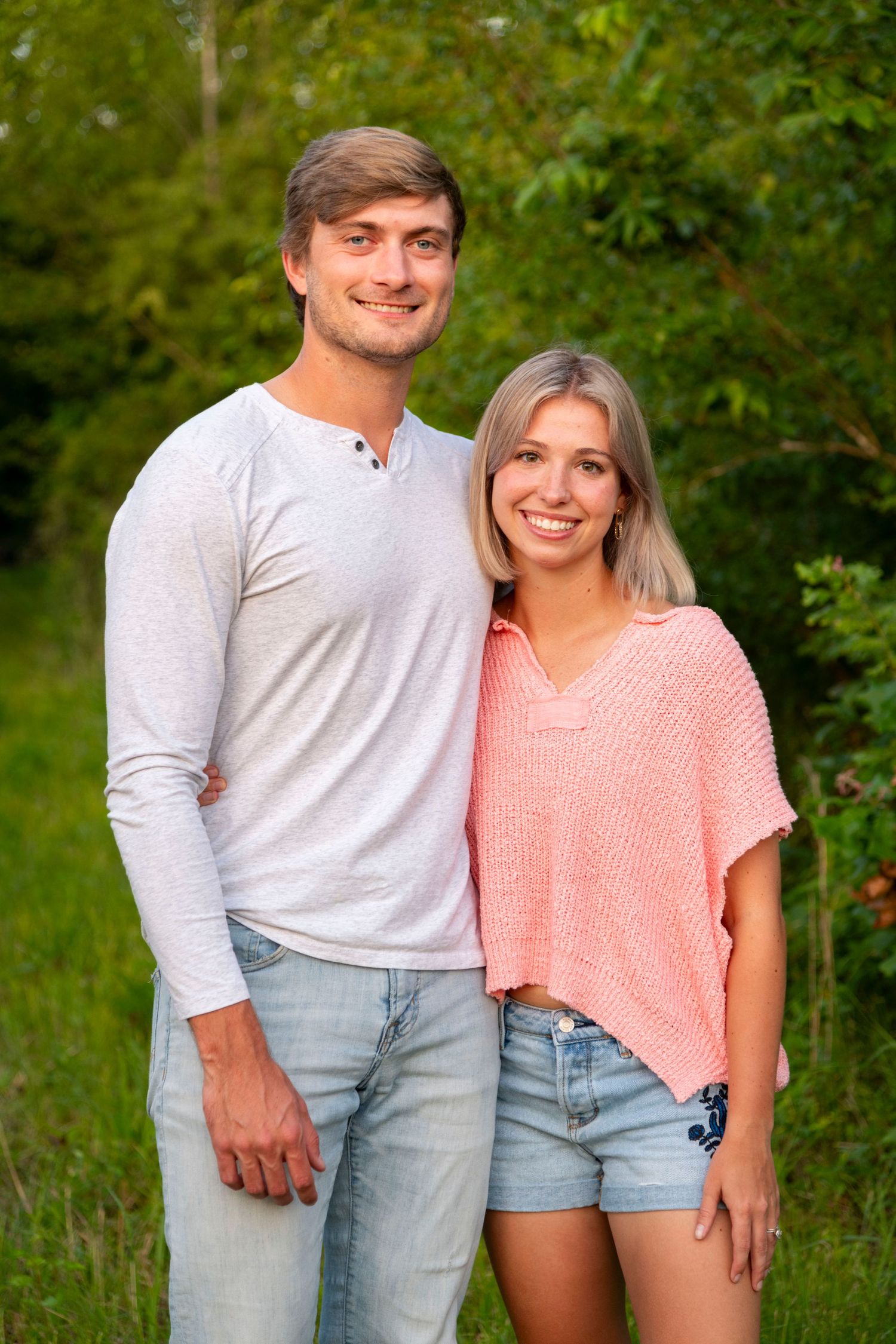 Family portraits in a field in Tupelo