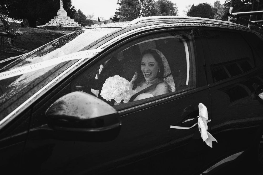 A sequence of black and white photos showing someone entering and sitting in the driver's seat of a car.