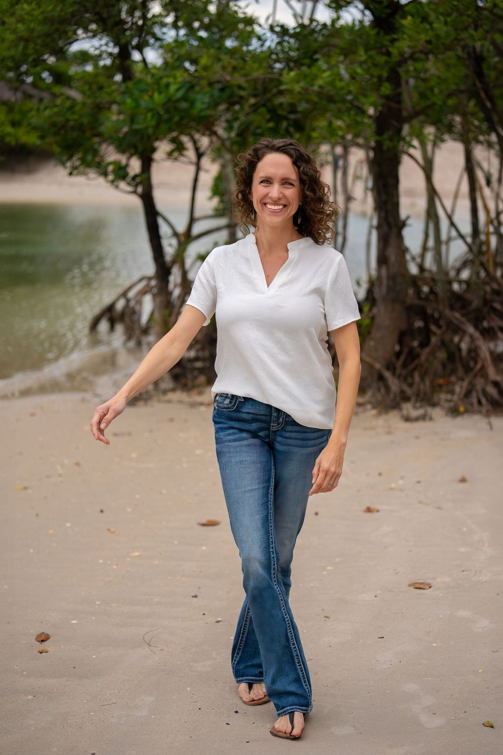 My sister, Casey, swaying and smiling on the beach in Dubois Park in Jupiter, Florida.