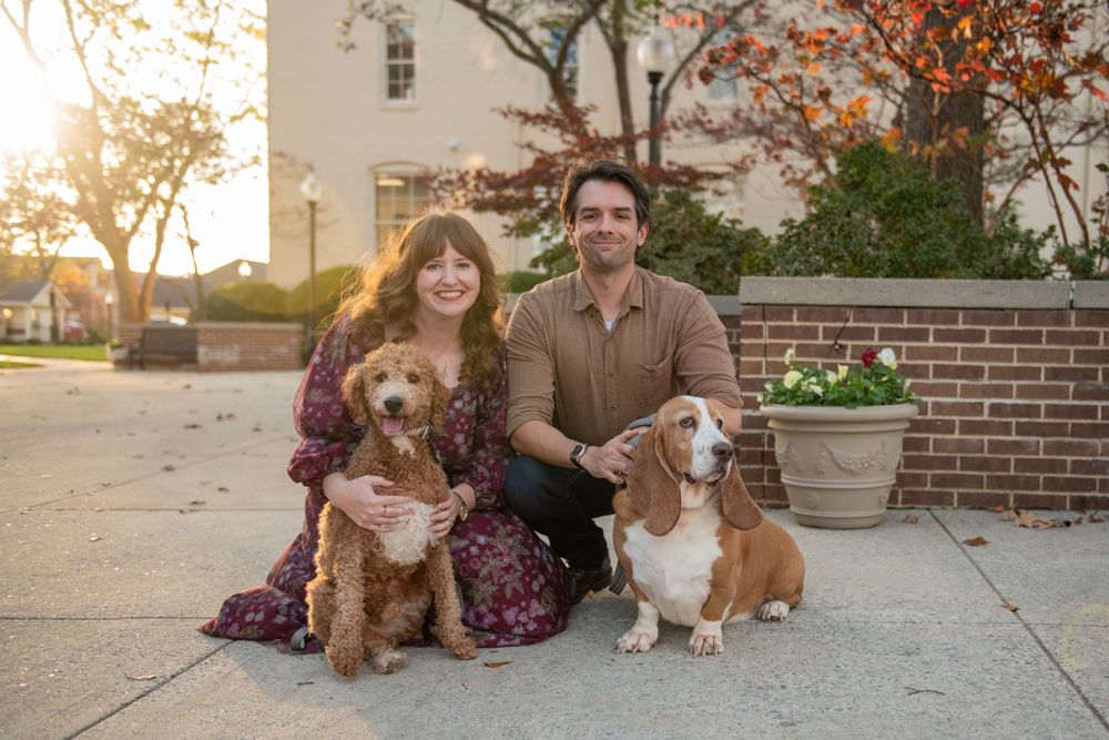 Family photo series with dogs sitting on concrete patio during golden hour.
